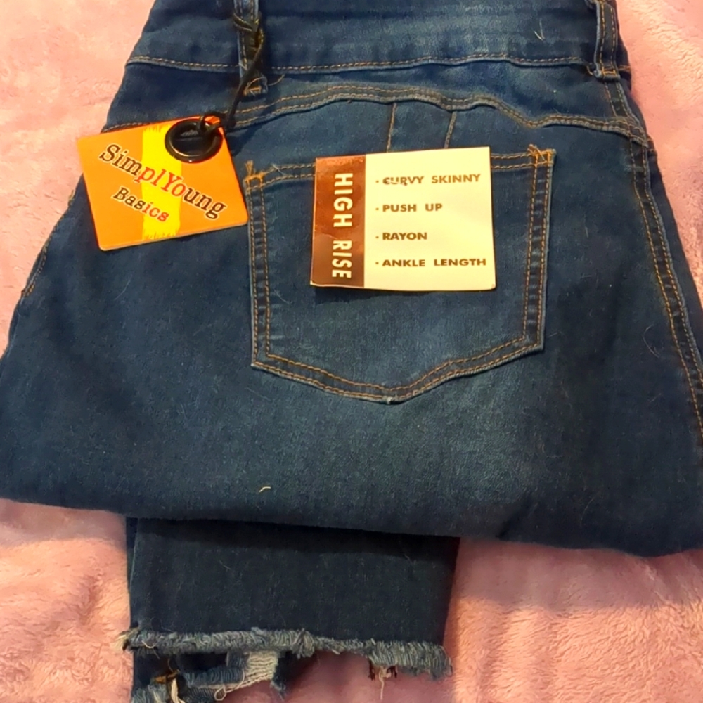 High Rise Blue Jeans with Distressed Hem